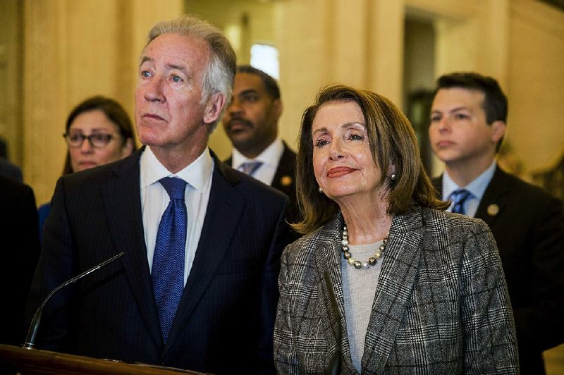 House Speaker Nancy Pelosi, with House Ways and Means Committee Chairman Richard Neal, appears Friday at a news conference in Belfast, Northern Island. Pelosi said she would hold a conference call Monday with all House Democrats to discuss what she called “a grave matter” arising from the special counsel report. 