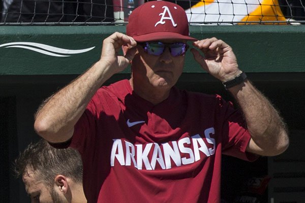 Arkansas coach Dave Van Horn watches from the dugout during a game against Mississippi State on Saturday, April 20, 2019, in Fayetteville. 