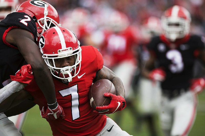 Junior D’Andre Swift (7) sits atop Georgia’s depth chart at tailback and “has set himself apart from the other offensive players because of his demeanor and body language,” said Coach Kirby Smart. 