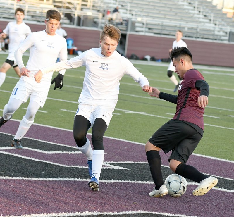 Bud Sullins/Special to Siloam Sunday Siloam Springs sophomore Franklin Cortez dribbles into the Greenbrier zone during Thursday's game at Panther Stadium. Siloam Springs defeated Greenbrier 1-0.