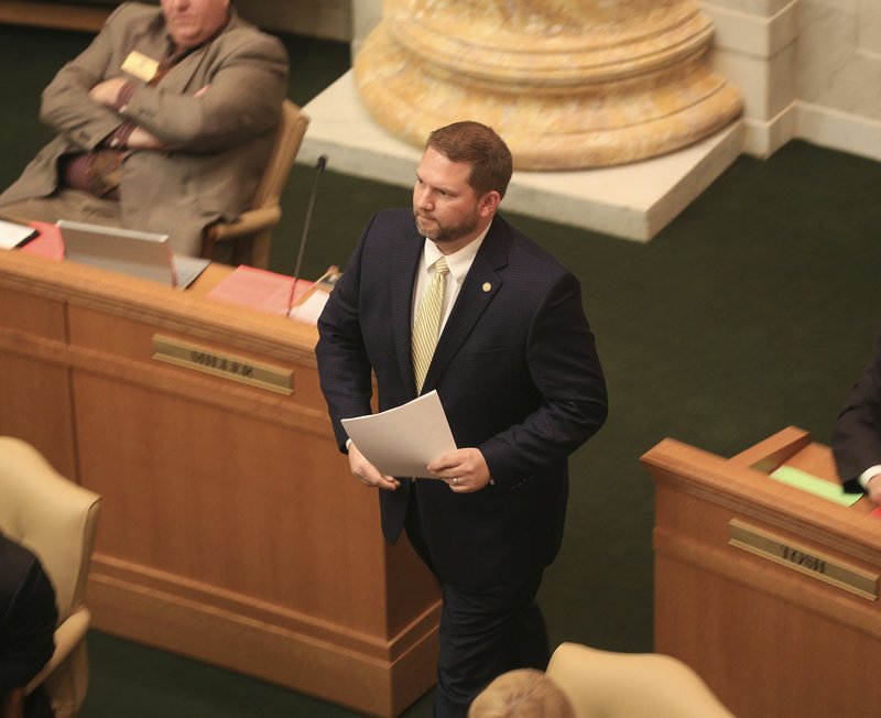 Arkansas Democrat-Gazette/STATON BREIDENTHAL Rep. Jim Dotson, R-Bentonville, presents Senate Joint Resolution 15 the House chamber April 1 that would set term limits 12 years, but then allow them to come back after sitting out four years.