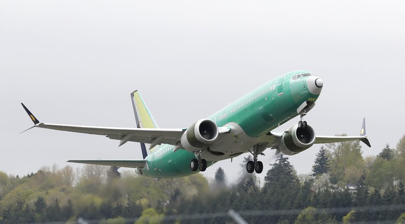 FILE - In this Wednesday, April 10, 2019 file photo, a Boeing 737 MAX 8 airplane being built for India-based Jet Airways, takes off on a test flight at Boeing Field in Seattle. A global team of experts next week will begin reviewing how the Boeing 737 Max's flight control system was approved by the U.S. Federal Aviation Administration. The FAA says experts from nine international civil aviation authorities have confirmed participation in a technical review promised by the agency. (AP Photo/Ted S. Warren, File)