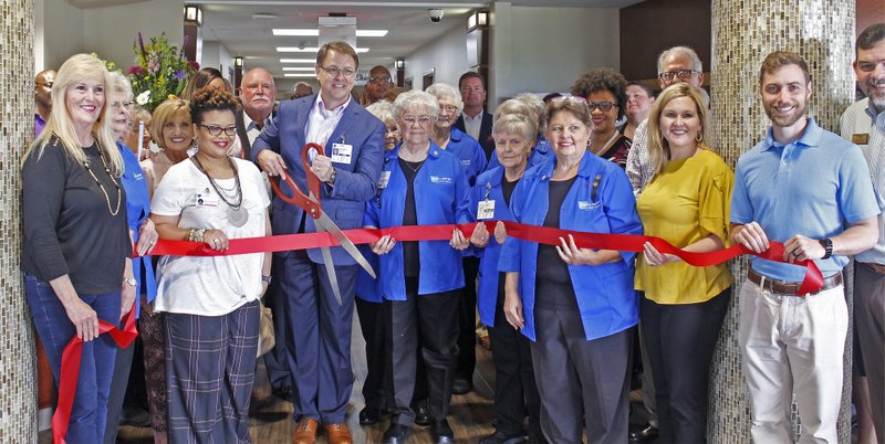 Ribbon cutting: Members of the El Dorado community came out Tuesday morning to the Medical Center of South Arkansas for the ribbon cutting of the newly renovated lobby. Michael Shine/News-Times