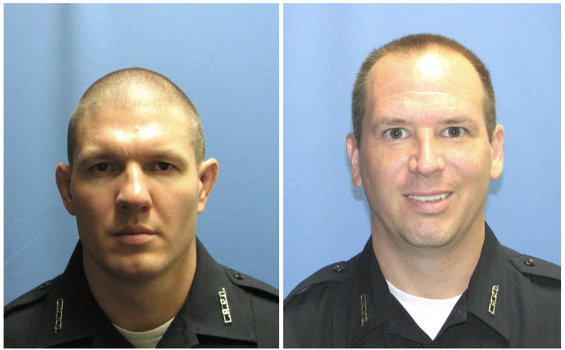 Little Rock officers Chandler Taylor, left, and Ryan Stubenrauch