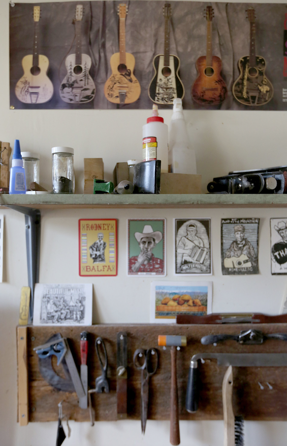 Aviva Steigmeyer’s artwork and tools are on display at her small Preservation Guitar Company shop. (NWA Democrat-Gazette/DAVID GOTTSCHALK)