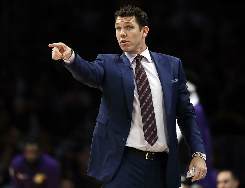 FILE - In this Oct. 20, 2018, file photo, Los Angeles Lakers head coach Luke Walton directs his team during the second half of an NBA basketball game against the Houston Rockets in Los Angeles. A person with direct knowledge of the agreement said Saturday, April 13, 2019, that Walton will become coach of the Sacramento Kings, just a day after parting ways with the Lakers following three losing seasons.   (AP Photo/Marcio Jose Sanchez, File)