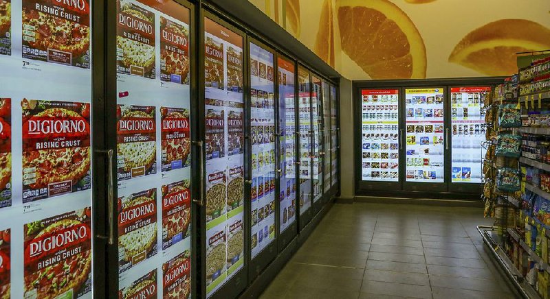 Walgreens, which has more than 8,000 drugstores, installed cooler doors with cameras and sensors at six U.S. locations, including this one last month in Chicago, which are designed to analyze shoppers expressions and reactions as they shop. 