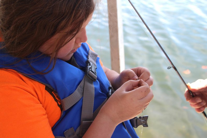 Photo submitted Baiting a hook is Samantha Newton from Mrs. Higson's class.