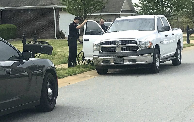 NWA Democrat-Gazette/ANNETTE BEARD Pea Ridge police investigate a schooting at 1072 Richards St. on Tuesday. One man was arrested and another was taken to Northwest Medical Center with an injury.