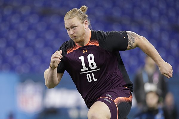 Arkansas offensive lineman Hjalte Froholdt runs a drill at the NFL football scouting combine in Indianapolis, Friday, March 1, 2019. (AP Photo/Michael Conroy)

