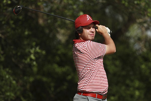 Julian Perico of Arkansas hits a tee shot during the Valspar Collegiate Invitational at the Floridian on Monday, March 18, 2019, in Palm City, Fla. (AP Photo/Scott Halleran )