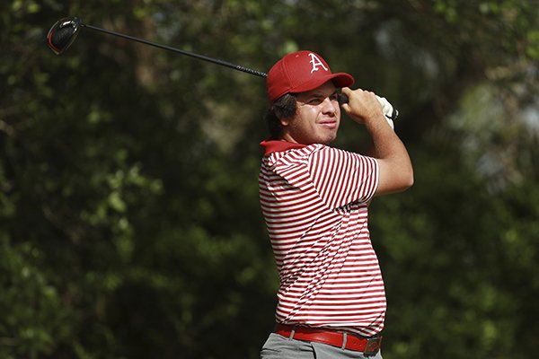 Julian Perico of Arkansas hits a tee shot during the Valspar Collegiate Invitational at the Floridian on Monday, March 18, 2019, in Palm City, Fla. (AP Photo/Scott Halleran )

