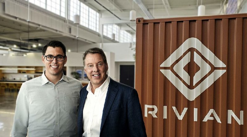 Rivian CEO R.J. Scaringe (left) and Ford Executive Chairman Bill Ford are joining forces to develop electric vehicles. “We believe the world needs to electrify,” Scaringe said. 