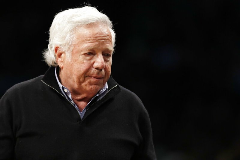 In this April 10, 2019, file photo, New England Patriots owner Robert Kraft leaves his seat during an NBA basketball game between the Brooklyn Nets and the Miami Heat, in New York. Attorneys for two Florida massage parlor employees plan to ask a judge to hold police and prosecutors responsible for the possible unauthorized release of video that they say shows New England Patriots owner Robert Kraft paying for sex. (AP Photo/Kathy Willens, File)