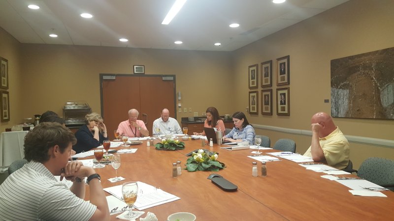 MRMC board members and Magnolia Mayor Parnell Vann (right) on April 22 discuss the long-term financial viability of Magnolia Regional Medical Center amid the facility’s severe recent decline of inpatient admissions.