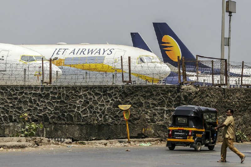 Jet Airways India Ltd. aircraft sit on the tarmac at Chhatrapati Shivaji Maharaj International Airport in Mumbai earlier this month. 