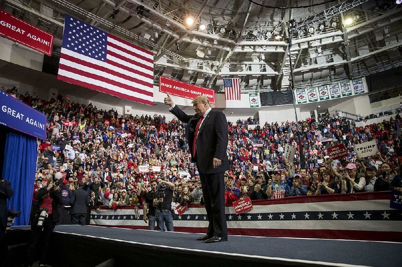 President Donald Trump gestures after speaking at a rally Saturday at Resch Center Complex in Green Bay, Wis. 