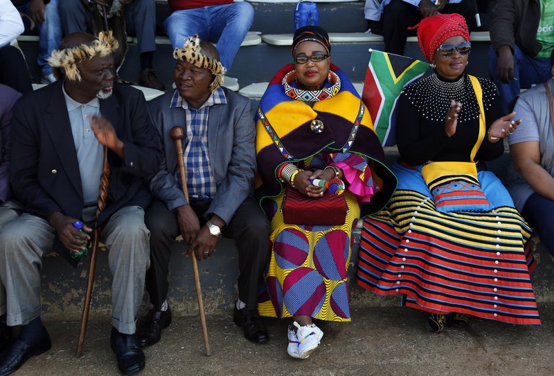 People attend Freedom Day celebrations in Kwa-Thema Township, near Johannesburg, Saturday April 27, 2019. The country celebrates the day which commemorates the 25th anniversary of the end of apartheid. (AP Photo/Denis Farrell)