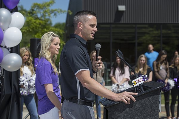 Fayetteville High School football coach Casey Dick speaks during his introductory news conference Friday, April 26, 2019, in Fayetteville. 