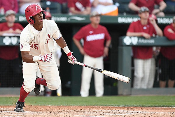 Arkansas outfielder Christian Franklin hits a home run during a game against Tennessee on Sunday, April 28, 2019, in Fayetteville. 