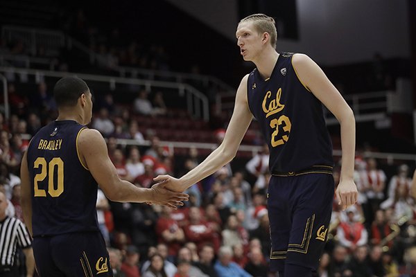 California guard Matt Bradley (20) celebrates with center Connor Vanover (23) during the first half of the team's NCAA college basketball game against Stanford in Palo Alto, Calif., Thursday, March 7, 2019. (AP Photo/Jeff Chiu)

