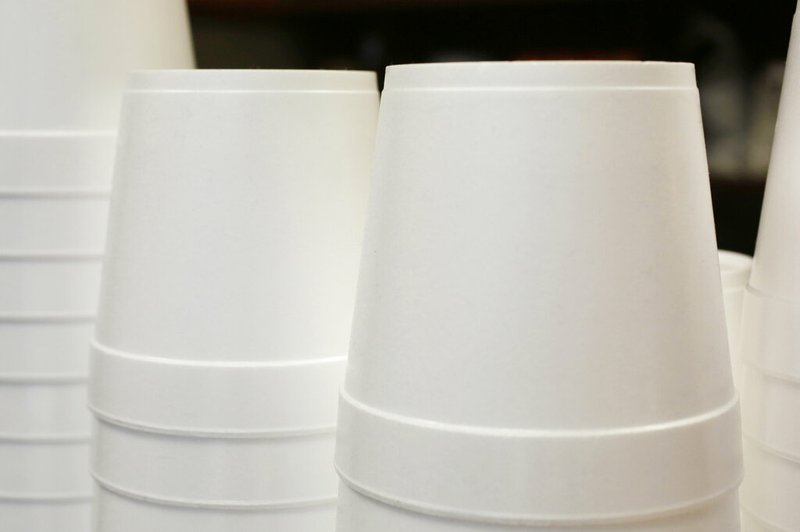 In this Feb. 14, 2013 file photo, polystyrene foam soup containers are stacked in a New York restaurant. Maine is banning single-use food and drink containers made from polystyrene foam. Democratic Gov. Janet Mills signed the bill into law Tuesday, April 30, 2019; environmental advocates say that makes Maine the first state to ban disposable foam food containers. Supporters say the law, which goes into effect Jan. 1, 2021, will reduce litter in the state's lakes, rivers and coastal waters. (AP Photo/Mark Lennihan, File)