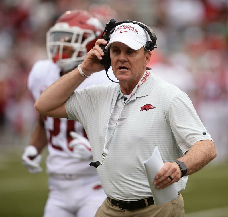 NWA Democrat-Gazette/ANDY SHUPE
Arkansas coach Chad Morris speaks to members of his offense Saturday, April 6, 2019, during the Razorbacks' spring game in Razorback Stadium in Fayetteville. Visit nwadg.com/photos to see more photographs from the game.