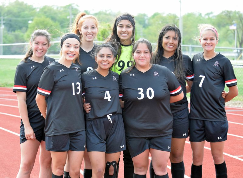 RICK PECK/SPECIAL TO MCDONALD COUNTY PRESS McDonald County High School honored its senior members of the 2019 girls' soccer team on April 25 at MCHS. Those honored are Ally Dill (front, left), Karen Gasca, Esmeralda Estrada, Baylee Payne (back, left), Alexia Kitlen, Nicole Salas, Helen Reyes and Leslie Yousey.