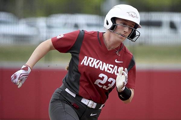 Arkansas baserunner Hannah McEwen rounds third base to score a run against Arkansas-Pine Bluff during an NCAA softball game on Tuesday, April 16, 2019 in Fayetteville. (AP Photo/Michael Woods)

