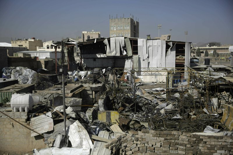 FILE - This April 10, 2019, file photo shows a view of the site of an airstrike by Saudi-led coalition in Sanaa, Yemen. A U.N.-commissioned report says the war in Yemen has set back its development by more than 20 years. The study commissioned by the U.N. Development Program found that if the war ends this year, it will have caused economic losses of $88.8 billion. (AP Photo/Hani Mohammed, File)