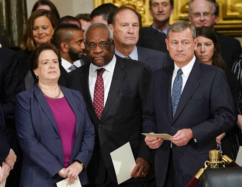 In this Dec. 3, 2018, file photo, from left, Supreme court Associate Justices Elena Kagan, Clarence Thomas, Samuel Alito and Chief Justice John Roberts arrive for services for former President George H.W. Bush at the U.S. Capitol in Washington. Thomas is now the longest-serving member of a court that has recently gotten more conservative, putting him in a unique and potentially powerful position, and he's said he isn't going away anytime soon. With President Donald Trump's nominees Neil Gorsuch and Brett Kavanaugh now on the court, conservatives are firmly in control as the justices take on divisive issues such as abortion, gun control and LGBT rights. (AP Photo/Pablo Martinez Monsivais, File)