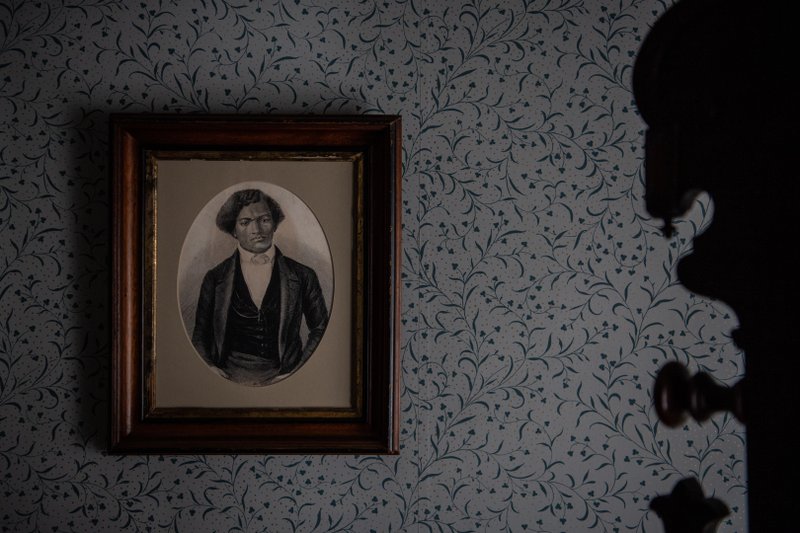 Frederick Douglass's framed photo is seen inside his room at his house in Washington. MUST CREDIT: Washington Post photo by Salwan Georges.