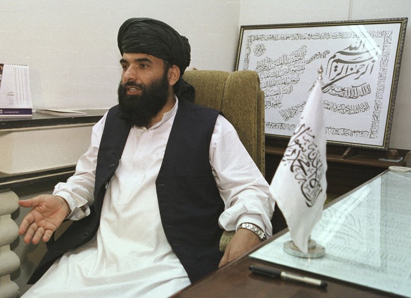 In this Nov. 14, 2001 file photo, Suhail Shaheen, then Deputy ambassador of the Islamic Republic of Afghanistan, gives an interview in Islamabad, Pakistan.  (AP Photo/Tariq Aziz, File)