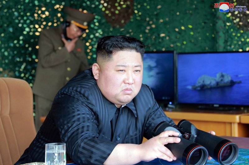 This Saturday, May 4, 2019, photo provided on Sunday, May 5, 2019, by the North Korean government shows North Korean leader Kim Jong Un, equipped with binoculars, observing tests of different weapons systems, in North Korea. North Korean state media on Sunday said leader Kim observed live-fire drills of long-range multiple rocket launchers and unspecified tactical guided weapons, a day after South Korea's military detected the North launching several unidentified short-range projectiles into the sea off its eastern coast. Independent journalists were not given access to cover the event depicted in this image distributed by the North Korean government. The content of this image is as provided and cannot be independently verified. Korean language watermark on image as provided by source reads: &quot;KCNA&quot; which is the abbreviation for Korean Central News Agency. (Korean Central News Agency/Korea News Service via AP)