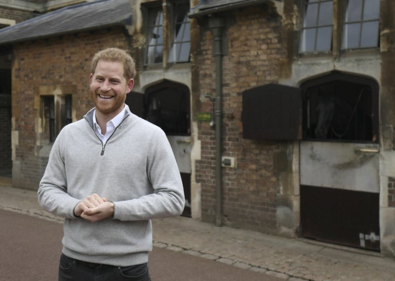 The Associated Press ROYAL BABY: Britain's Prince Harry speaks at Windsor Castle, Windsor, England, Monday, after his wife Meghan, the Duchess of Sussex gave birth to a baby boy. It is the first child for Harry and Meghan, who married a year ago.