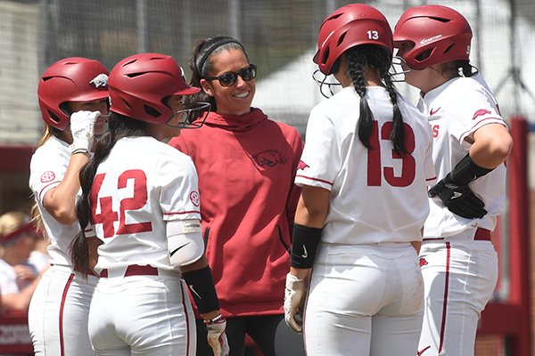 Arkansas coach Courtney Deifel talks to players during a game against Auburn on Sunday, May 5, 2019, in Fayetteville. 