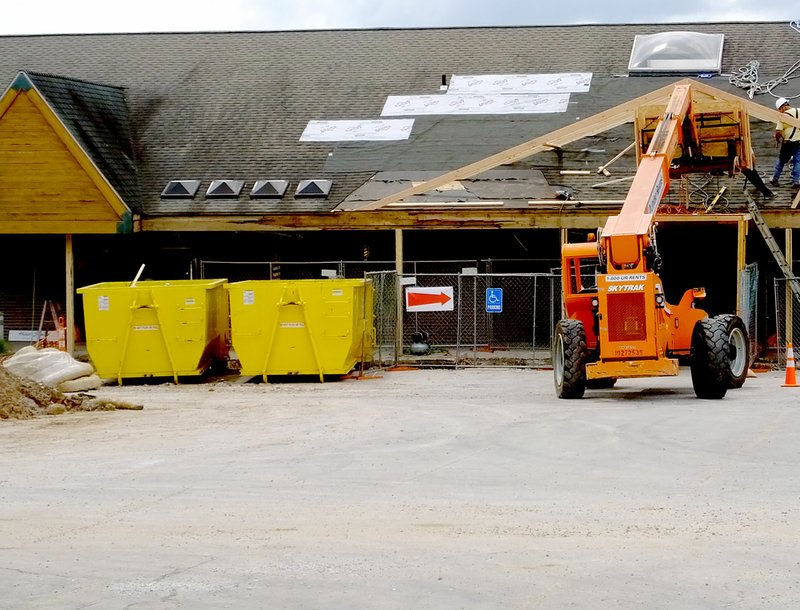 Lynn Atkins/The Weekly Vista Town Center Barbershop is open in the midst of construction.