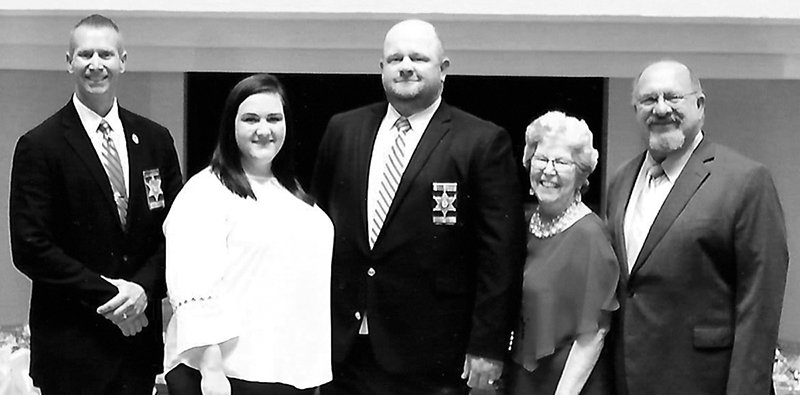 Submitted photo ELKS HONOR: From left are Garland County Under Sheriff Jason Lawrence, Brandi Cannon, sheriff's Sgt. Joshua Cannon, recipient of ASEA Enrique Camarena Award, Kacky Carey, chairman, Americanism Committee Lodge 380, and Lou Pettiford, chairman of the Accident Prevention Committee Lodge 380.