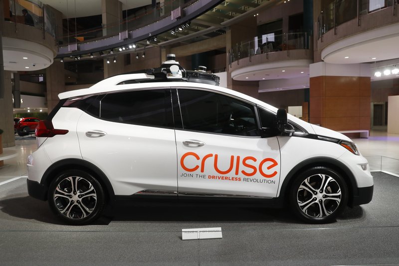 In this Jan. 16, 2019, file photo, Cruise AV, General Motor's autonomous electric Bolt EV is displayed in Detroit. A group of institutional investors is sinking $1.15 billion into GM Cruise LLC, the autonomous vehicle unit of General Motors. (AP Photo/Paul Sancya, File)