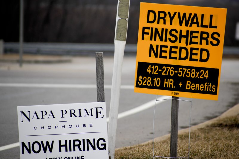 In this March 1, 2019, photo signs for employment opportunities are posted at an exit ramp off of Interstate 79 in Zelienople, Pa. On Tuesday, May 7, the Labor Department reports on job openings and labor turnover for March. (AP Photo/Keith Srakocic)