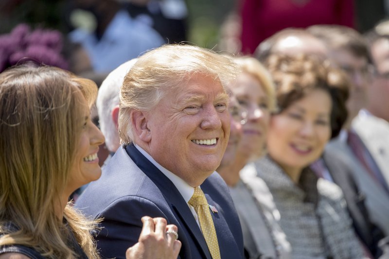 President Donald Trump and First lady Melania Trump, left, smile during a one year anniversary event for her Be Best initiative in the Rose Garden of the White House, Tuesday, May 7, 2019, in Washington. (AP Photo/Andrew Harnik)

