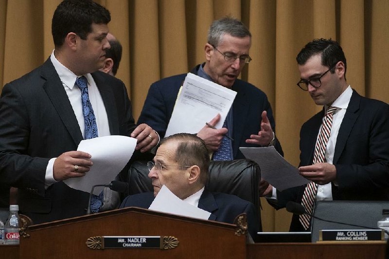 House judiciary panel Chairman Jerrold Nadler is surrounded by committee staff members Wednesday as he prepares to call a vote on holding Attorney General William Barr in contempt of Congress. 