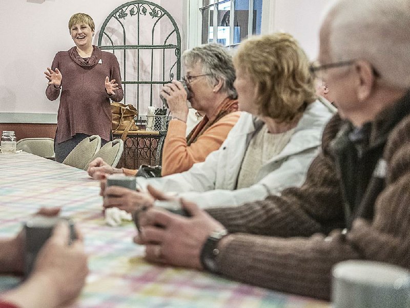 Amy Gallant, AARP Maine advocacy director, leads a discussion last month in Lewiston, Maine, about rising costs of prescription drugs.