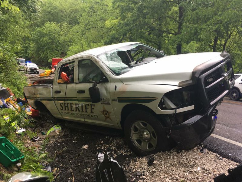 Courtesy Photo/WASHINGTON COUNTY SHERIFF'S OFFICE A Washington County Sheriff's Office vehicle after an accident on Arkansas 12 in Benton County.