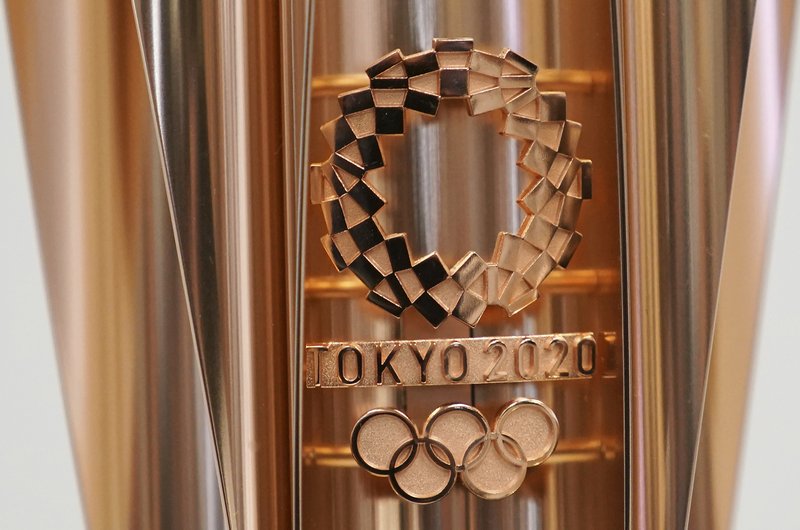This March 20, 2019, file photo shows the emblem of the Olympic torch of the Tokyo 2020 Olympic Games during a press conference in Tokyo. (AP Photo/Eugene Hoshiko, File)