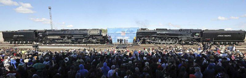 Locomotives Big Boy, No. 4014 (left) and the Living Legend, No. 844 (right) are photographed Thursday at Union Station in Og- den, Utah, during the commemoration of the 150th anniversary of the Transcontinental Railroad completion. 