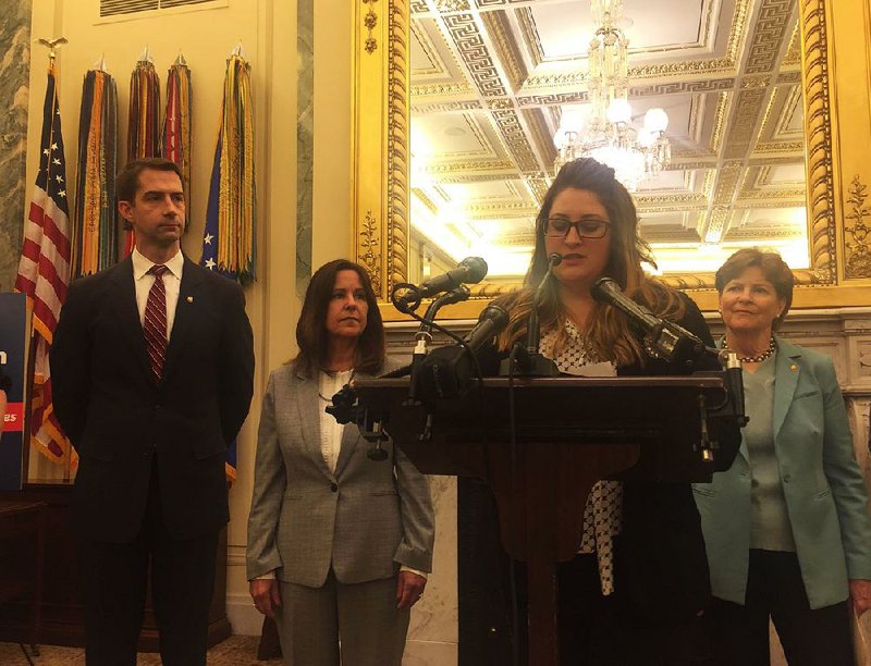 Brittany Boccher, a military spouse who lives with her family in Austin, speaks Thursday at a Capitol Hill news conference attended by U.S. Sen. Tom Cotton (left) and Karen Pence, wife of Vice President Mike Pence.