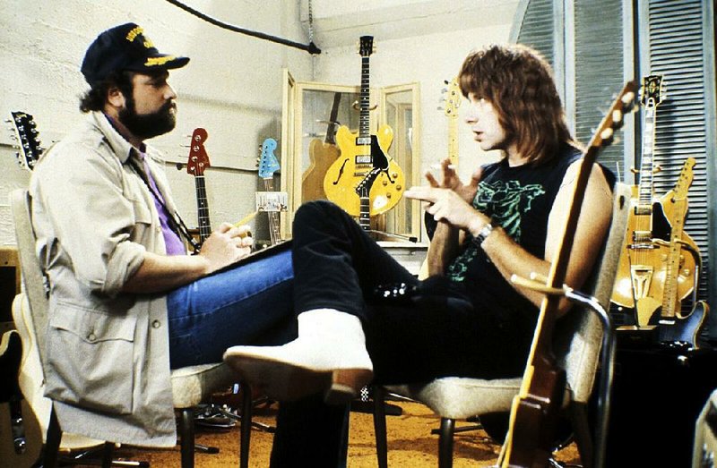Metafictional documentary director Marty DiBergi (Rob Reiner) debriefs Nigel Tufnel (Christopher Guest) in a scene from This Is Spinal Tap, which celebrated the 35th anniversary of its release at the recent Tribeca Film Festival. 