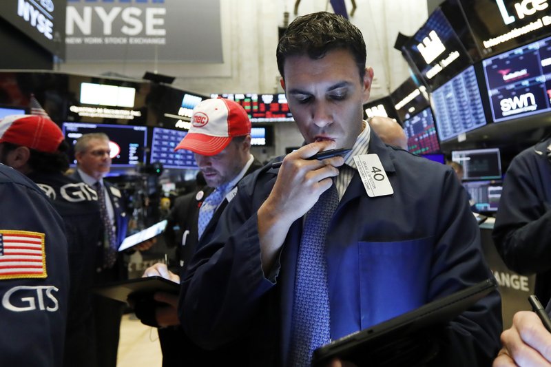 Trader Craig Spector works on the floor of the New York Stock Exchange, Thursday, May 9, 2019. Stocks are opening broadly lower on Wall Street as investors keep a close eye on trade talks between the U.S. and China. (AP Photo/Richard Drew)