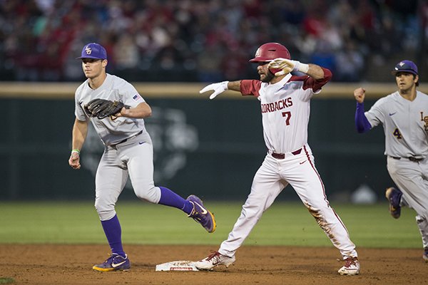 Arkansas' Jack Kenley reacts after advancing to second base during a game against LSU on Thursday, May 9, 2019, in Fayetteville. 